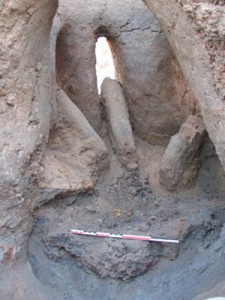 Fig.4. Inside the tank of a great reduction furnace at Saré-Ma. Several big tuyeres are still inside the thank. Photo C. Robion-Brunner